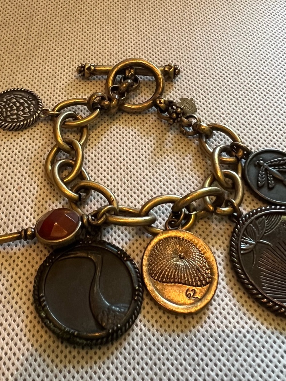 Lucky Brand cooper colored and Black gold Charm Bracelet with Red Accent - Brand